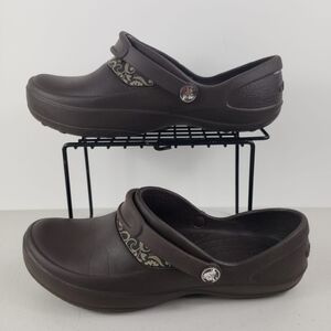 Crocs Woman's slip on mules brown Sz 7